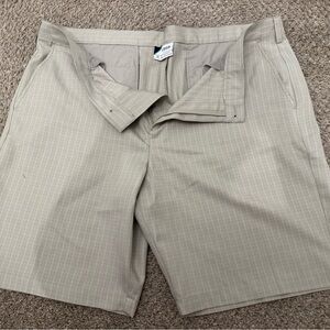 IZOD Golf men’s shorts tan color with light stripes size 40 used once